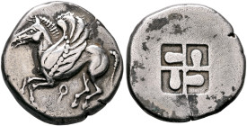 CORINTHIA. Corinth. Circa 550-500 BC. Stater (Silver, 22 mm, 8.45 g). Pegasos flying left; below, Ϙ. Rev. Quadripartite incuse square with swastika pa...