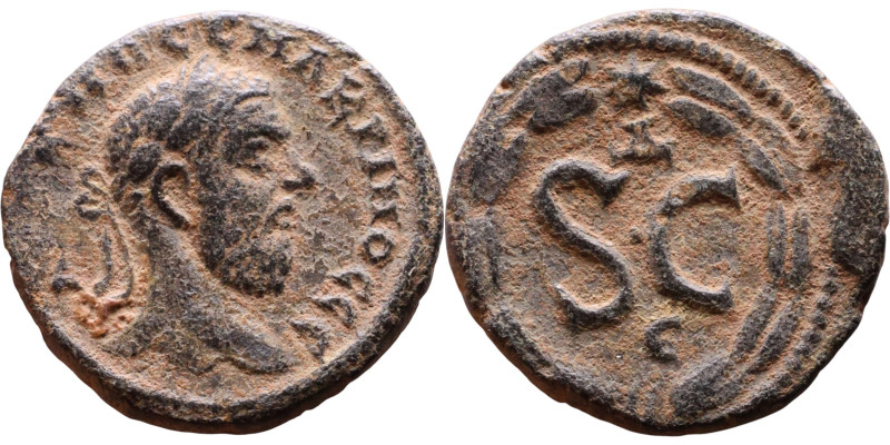 Macrinus (217-218) Syria: Antioch Obv: Bust of emperor. Rev: Large S C

19mm 4...