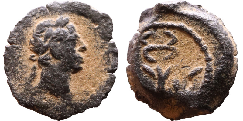 Trajan (98-117) Bronze coin. Obv: Laureate, draped bust of emperor. Rev: winged ...