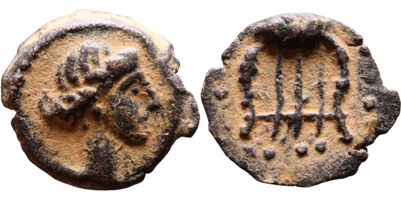 Nero (54-68) Antioch Syria. Bronze Obverse: head of Apollo, right Reverse: Lyre...
