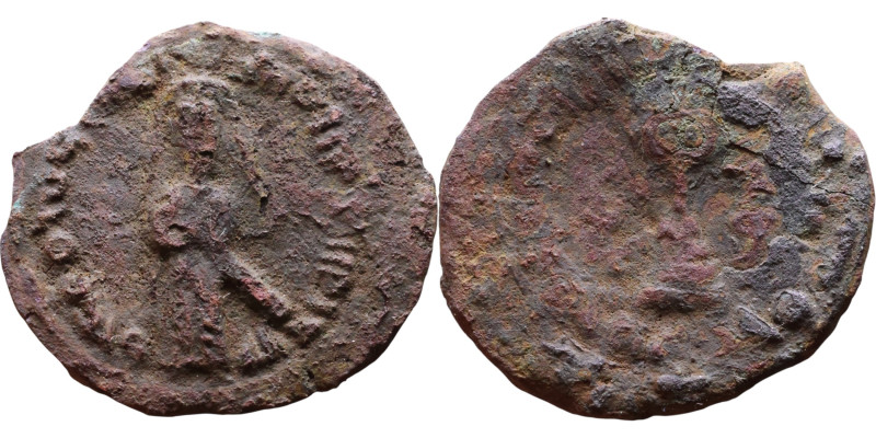 al-Malik ibn Marwan (687-705) Follis. Obverse: Standing caliph Reverse: Modified...
