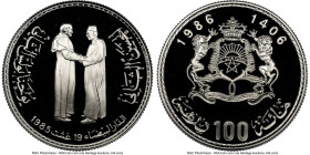 al-Hassan II silver Proof "Papal Visit" 100 Dirhams AH 1406 / 1986 PR70 Ultra Cameo NGC, KM-Y80. From the Globus Collection HID09801242017 © 2024 Heri...