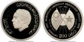 al-Hassan II silver Proof "Moroccan-American Friendship Treaty" 200 Dirhams AH 1408 / 1987 PR69 Ultra Cameo NGC, KM-Y81. From the Globus Collection HI...