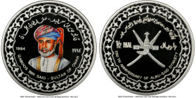 Qabus bin Sa'id silver Colorized Proof "250th Anniversary of Al Bu Sa'id Dynasty" 1/2 Omani Rial 1994 PR69 Ultra Cameo NGC, KM111. Mintage: 500. From ...