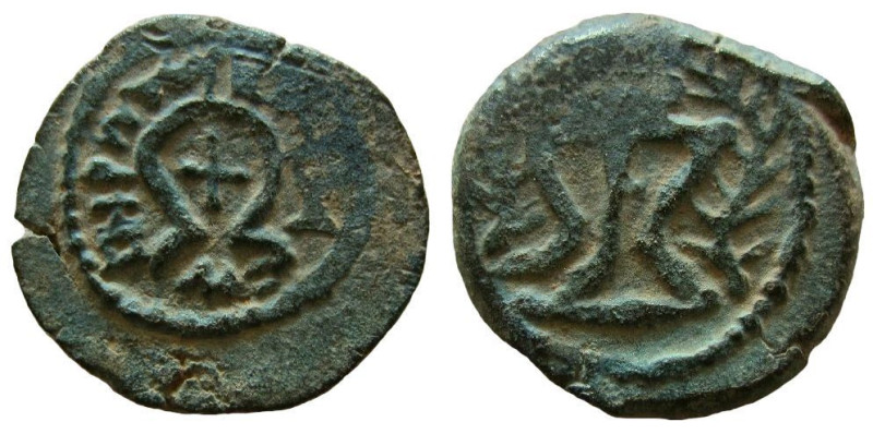 Judaea. Herod the Great, 40-4 BC. AE 2 Prutot.

Weight: 3.62 gm. 
Obverse: X ...