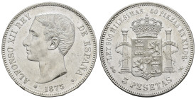 ALFONSO XII. 5 pesetas. 1875*1875 Madrid. DEM. AR 24,93 g. 37,3 mm. VII-81; AC-35. Pequeñas marcas y defecto en gráfila. R.B.O. EBC+.