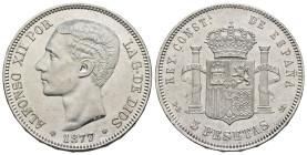 ALFONSO XII. 5 pesetas. 1877*1877 Madrid. DEM. AR 24,9 g. 37,4 mm. VII-83; AC-38. Golpecitos y rayita en rev. B.O. EBC+.