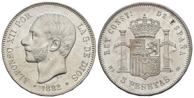 ALFONSO XII. 5 pesetas. 1882*18-82 Madrid. MSM. AR 25,07 g. 37,6 mm. VII-88; AC-51. Pequeñas marcas. Pleno B.O. SC.