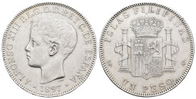 ALFONSO XIII. Peso. 1897 Manila. SGV. AR 24,95 g. 37,1 mm. VII-192; AC-122. Pequeñas marcas y golpecito en anv. y en gráfila. MBC+.