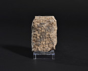 ARQUEOLOGÍA. PRÓXIMO ORIENTE. Mesopotamia. Tablilla con escritura cuneiforme (ca. 2000 a.C.). Terracota. Longitud 7 cm. Presenta faltas. Adjunta certi...
