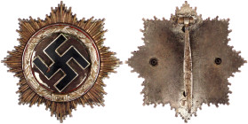 Deutschland
Drittes Reich, 1933-1945
Deutsches Kreuz in Gold 1941. 4-fach genietet, ohne Herstellerangabe. 73,48 g. sehr schön, Emailleschäden und P...