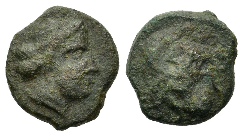 Sicily, Syracuse, c. 435-415 BC. Æ Onkia (11,6mm,1.7g). Head of Arethusa r.; dol...