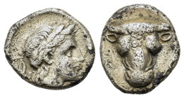 Phokis, Federal Coinage. Time of the Third Sacred War, circa 354-352 BC. AR Triobol (12,6mm,2.6g). Bull's head facing. R/ Laureate head of Apollo r., ...