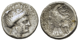 Euboia, Chalkis, c. 338-308 BC. AR Drachm (16,3mm,3.4g). Head of nymph r. R/ X-AΛ, eagle flying r., carrying snake in talons and beak; to l., monogram...