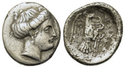 Euboia, Chalkis, c. 338-308 BC. AR Drachm (16,6mm,3.2g). Head of nymph r. R/ X-AΛ, eagle flying r., carrying snake in talons and beak; to l., monogram...