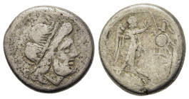 Anonymous, 208 BC. AR Victoriatus (15,6mm,2.9g). Mint in southeast Italy. Laureate head of Jupiter r. R/ Victory standing r., crowning trophy with wre...