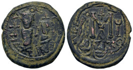 Arab-Byzantine. AD 610-630 imitating Heraclius with Constantine Æ
Follis (29mm, 11.2g). Heraclius with Constantine standing, facing. R/
Large M with c...