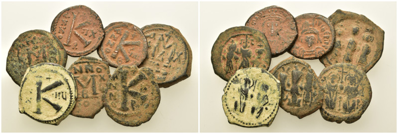 Lot of 7 Æ Byzantine coins, to be catalogued. Lot sold as is, no return.