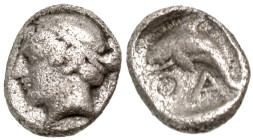 Islands off Thrace, Thasos. ca. 411-340 B.C. AR hemiobol (7.4 mm, .30 g, 6 h). Diademed head of nymph left / A-Θ, dolphin swimming left; within shallo...