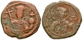 John II Comnenus. 1118-1143. AE tetarteron (18.9 mm, 4.07 g, 7 h). Constantinople mint. Facing bust of Christ, wearing pallium and colobium, raising h...