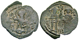 Andronicus II and Michael IX. 1295-1320. AE assarion (21.19 mm, 1.48 g, 7 h). Constantinople mint. AVTOK[PATOPЄC] Rω[MAIωN], Andronicus and Michael ea...
