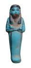 An Egyptian faience ushabti, Late New Kingdom, ca. 1100 - 1056 B.C. , mummiform, wearing tripartite wig, arms folded across chest, a hoe in each hand;...