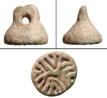 A large steatite stamp seal, Levante, ca. 2nd Millenium B.C. , conical in form with a tall squared handle with suspension hole. On the base a stylized...