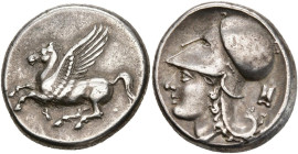 CORINTHE, AR statère, 386-307 av. J.-C. D/ Pégase en vol à g. Dessous, . R/ T. casquée d'Athéna à g. Sous le menton, [A]. Derrière la nuque, astragal...