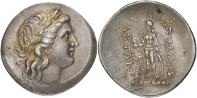 MYSIE, PARION, AR tétradrachme, vers 165-160 av. J.-C. D/ T. l. d'Apollon à d. R/ Apollon nu jusqu'à la taille, deb. de f., t. à g., ten. un rameau et...