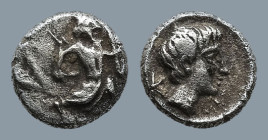 CILICIA. Uncertain. (4th century BC)
AR Tetartemorion (5,7mm 0,23g)
Obv: The Persian Great King in kneeling-running stance right, holding dagger in ...