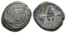 KINGS OF MACEDON. Alexander III 'the Great' (336-323 BC). Ae. Sardes.
Obv: Macedonian shield with kerykeion on boss.
Rev: B - A.
Macedonian helmet bet...