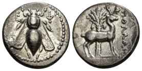 IONIA. Ephesos. Drachm (Circa 202-150 BC).
Obv: Ε - Φ. Bee.
Rev: Stag standing right; palm tree in background. 4,11 g - 18,47 mm
