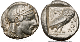 ATTICA. Athens. Ca. 475-465 BC. AR tetradrachm (23mm, 17.16 gm, 5h). NGC Choice XF 5/5 - 3/5, light graffito. Early transitional issue. Head of Athena...