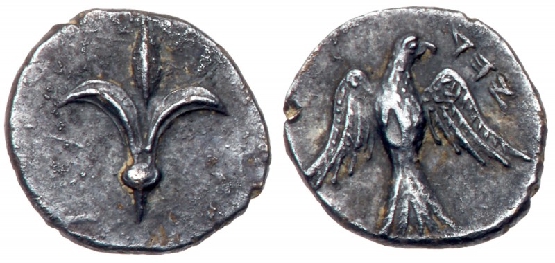 Judaea, Yehud (Judah). Silver 1/2 Gerah (0.37 g), ca. 375-332 BCE. Lily. Reverse...