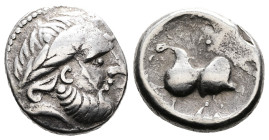 Celts in Eastern Europe, circa 3rd century BC. AR Tetradrachm (Silver, 21.9 mm, 12.07 g.). „Kugelwange” Type. Celticised, bearded head wearing reverse...