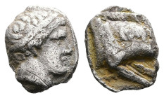 Paeonia. Patraos, circa 340-315 BC. AR Drachm (Silver, 11.3 mm, 2.71 g.). Paeonian standard. Diademed head of Apollo to right. Rev. Forepart of boar t...