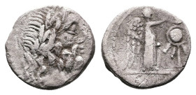 Anonymous, 211-208 BC. Rome. Silver Victoriatus (13 mm, 1.44 g.). Laureate head of Jupiter to right. Rev. Victory standing right, crowning trophy with...