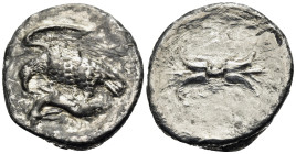 BRUTTIUM. Lokroi Epizephyrioi. Circa 400-350 BC. Stater (Silver, 22 mm, 6.46 g, 11 h). Eagle with spread wings standing to left, tearing at hare held ...
