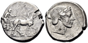SICILY. Katane. Circa 450-445 BC. Tetradrachm (Silver, 28 mm, 17.15 g, 6 h). Charioteer, wearing long chiton, holding reins with his right hand and ke...