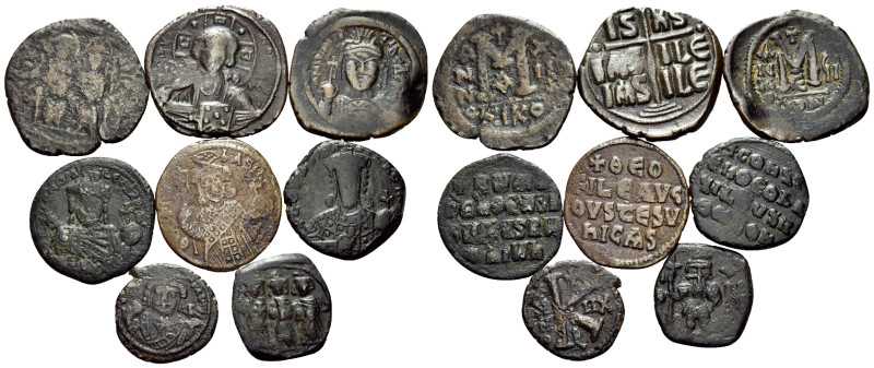 BYZANTINE. Circa 6th-11th century. (Bronze, 62.00 g). Large lot of eight (8) Byz...
