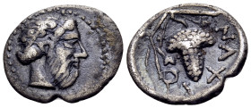 SICILY. Naxos. Circa 461-430 BC. Litra (Silver, 13 mm, 0.73 g, 1 h). Bearded head of Dionysos to right, wearing ivy wreath. Rev. NAXIO Bunch of grapes...