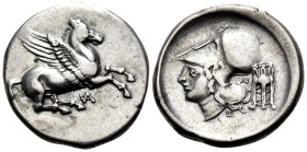 AKARNANIA. Anaktorion. Circa 350-300 BC. Stater (Silver, 23 mm, 8.39 g, 11 h). Pegasos flying to right; below, monogram. Rev. Head of Athena facing to...
