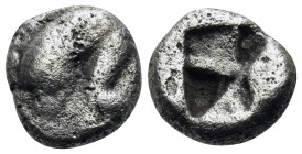 PHLIASIA. Phlious. late 6th-early 5th century BC. Obol (Silver, 9 mm, 1.07 g). Human leg bent to right. Rev. Incuse square divided into six irregular ...