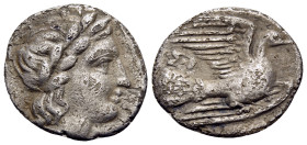 SIKYONIA. Sikyon. Circa 340s-320s BC. Obol (Silver, 12 mm, 0.85 g, 11 h). Laureate head of Apollo to right, with his hair falling in locks down the ba...