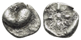 KYRENAIKA. Kyrene. Circa 525-480 BC. Obol (Silver, 7.5 mm, 0.43 g, 12 h). Silphium fruit with point downwards. Rev. Stellate pattern within incuse squ...