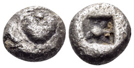 KYRENAIKA. Kyrene. Circa 500-480 BC. Obol (Silver, 7.5 mm, 0.78 g, 12 h). Silphium fruit. Rev. Stellate pattern within incuse square. BMC 33. SNG Cope...