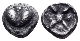 KYRENAIKA. Kyrene. Circa 500-480 BC. Hemiobol (Silver, 6 mm, 0.35 g, 3 h). Silphium fruit with pellet above and below. Rev. Star with four rays and ce...