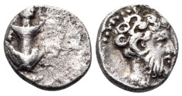 KYRENAIKA. Kyrene. Circa 435-400 BC. Obol (Silver, 9 mm, 0.64 g, 8 h). Silphium plant. Rev. Bearded head of Zeus Ammon to right, with ram's horn above...
