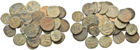 ISLAMIC, Umayyad/Abbasid caliphate. Circa 8th-9th century. (Bronze, 79.00 g). 28 coins, varied surfaces and patinations, most with earthen highlights,...