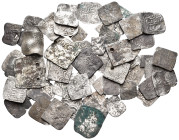 ISLAMIC, Moroccan dynasties. Circa 12th-14th century. (Silver, 44.00 g). A group of 60 mainly Almohad and Marinid Square Dirhams, as well rare fractio...